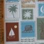 Preview: Baumwolljersey Briefmarken Reisemotive grün beige blau